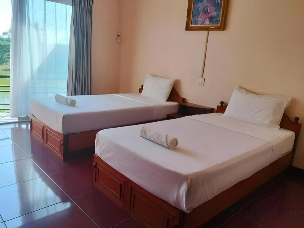 Bed in Rawanda Resort Hotel