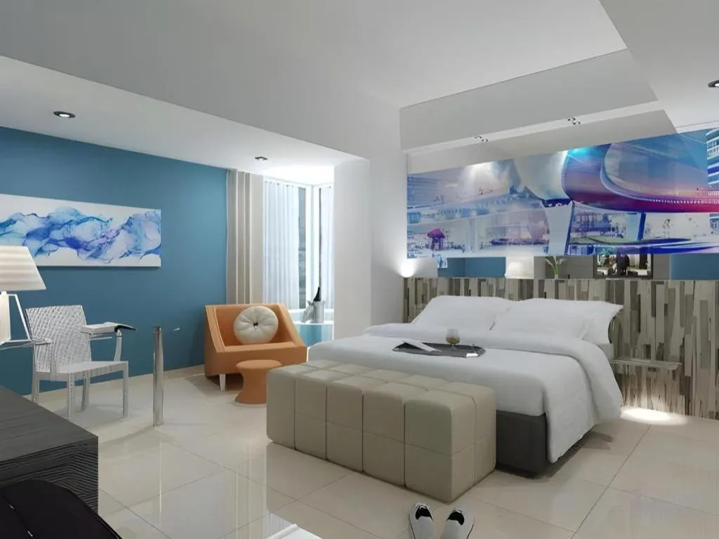 Bed in G Suites Hotel By AMITHYA