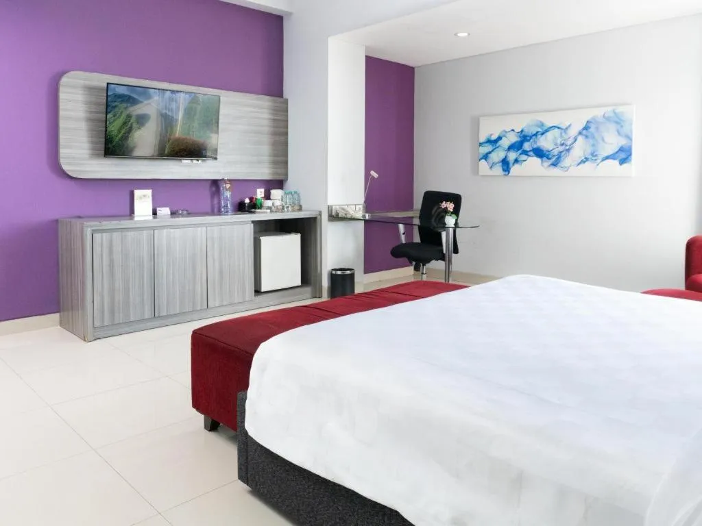 Bed in G Suites Hotel By AMITHYA