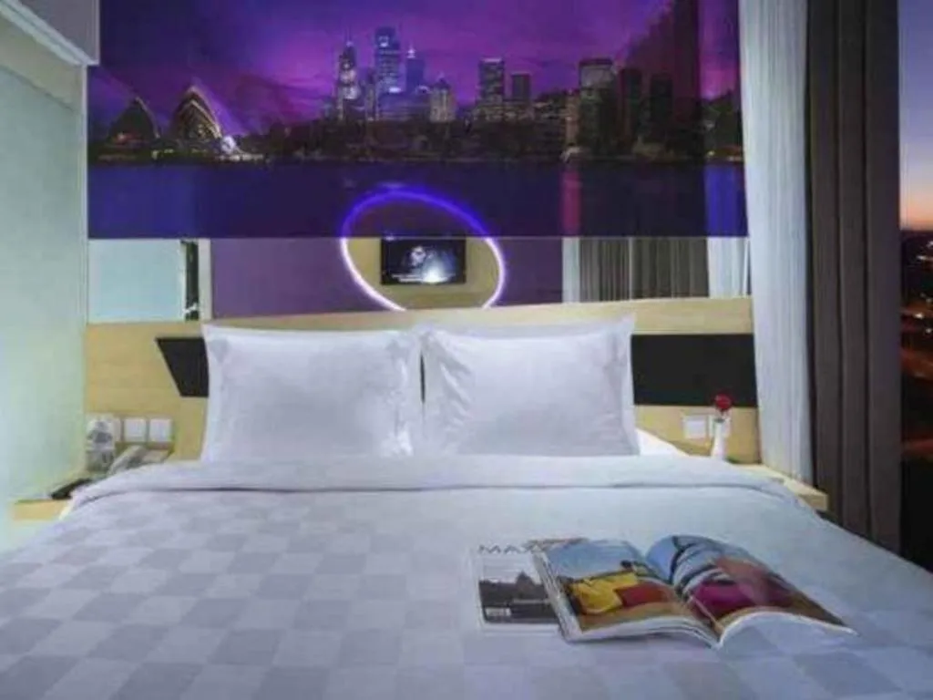 Bed in G Suites Hotel By AMITHYA