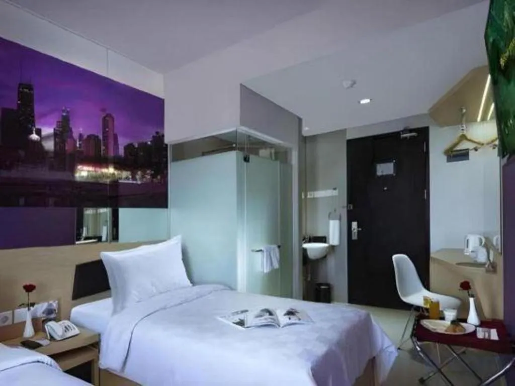 Bed in G Suites Hotel By AMITHYA