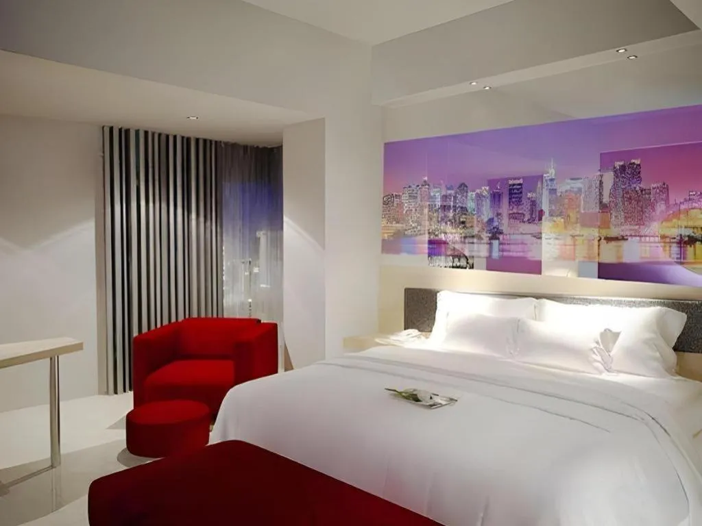 Bed in G Suites Hotel By AMITHYA