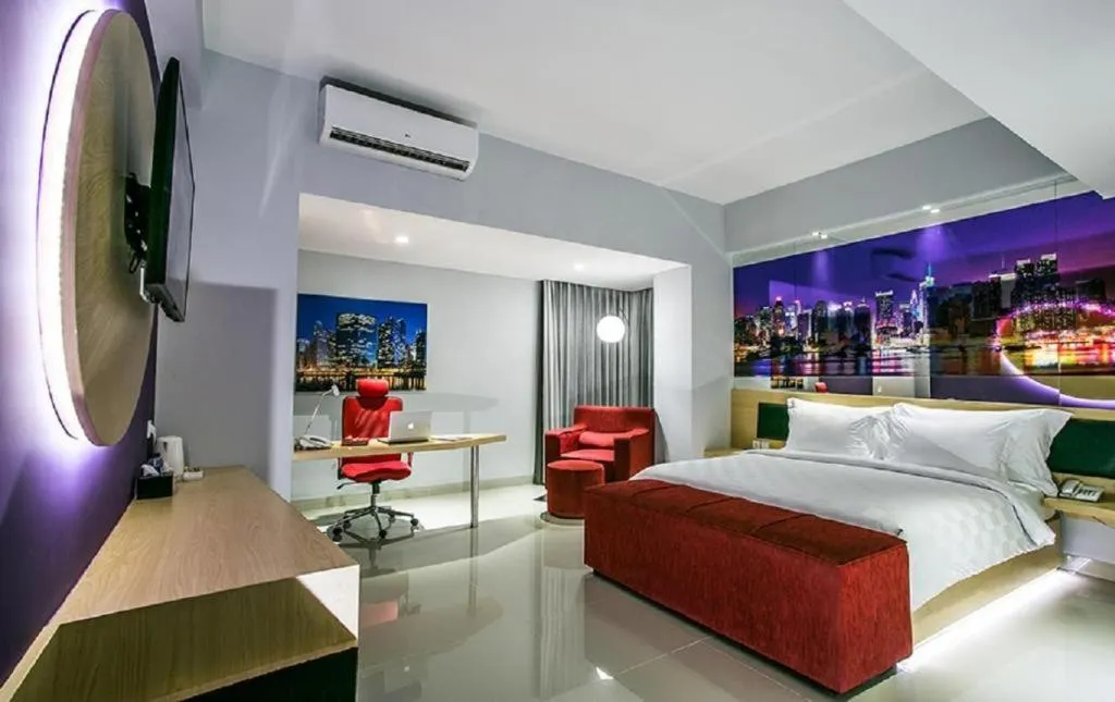 Bed in G Suites Hotel By AMITHYA