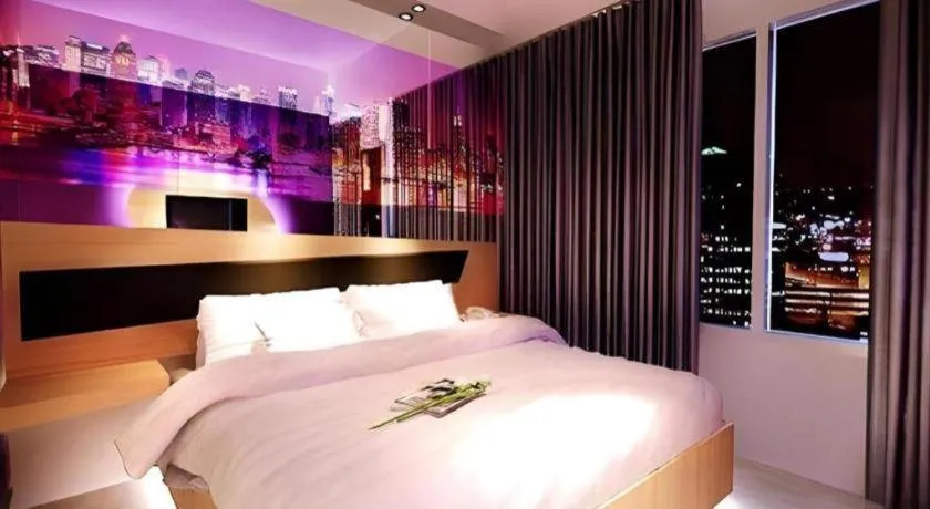 Bed in G Suites Hotel By AMITHYA