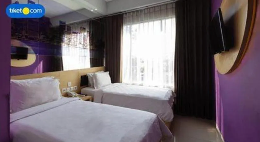 Bed in G Suites Hotel By AMITHYA