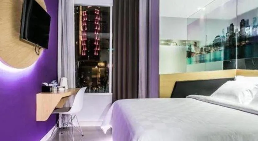 Bed in G Suites Hotel By AMITHYA