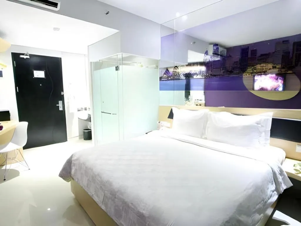 Bed in G Suites Hotel By AMITHYA