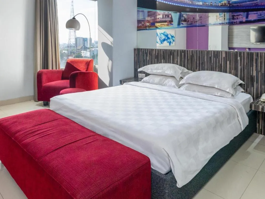 Bed in G Suites Hotel By AMITHYA