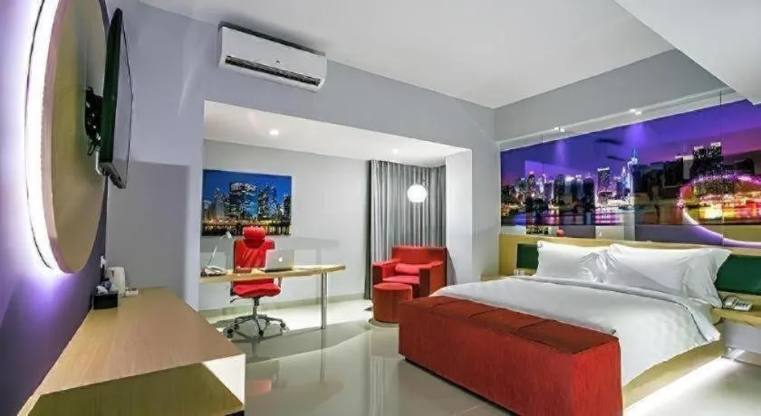 Bed in G Suites Hotel By AMITHYA