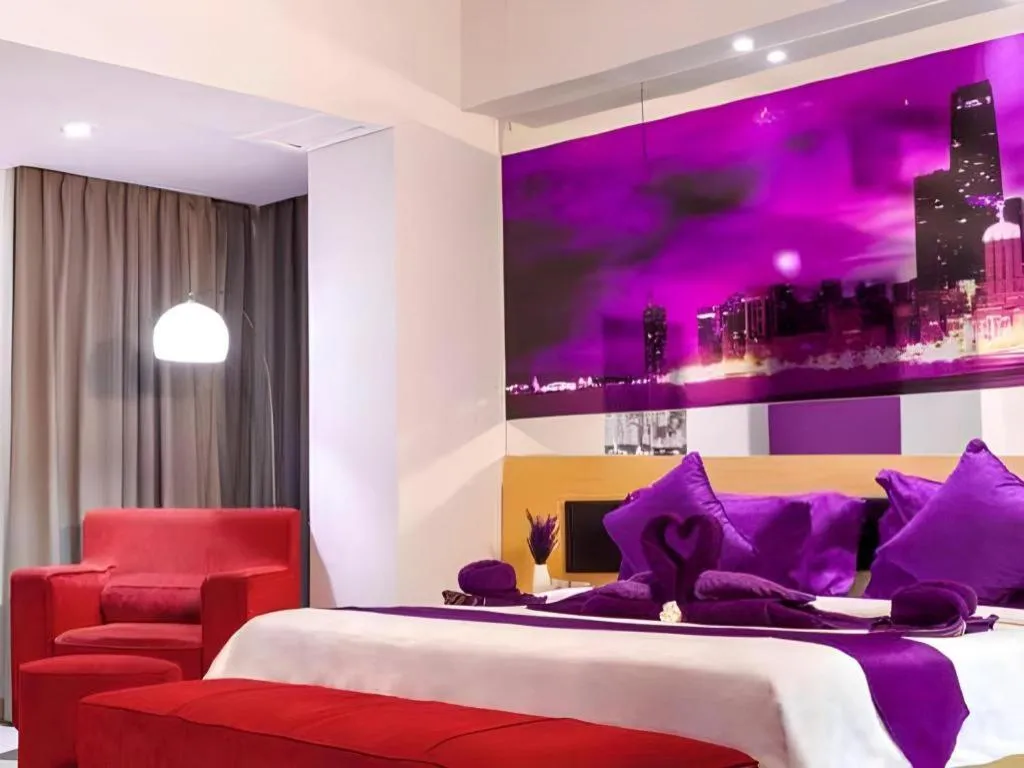 Bed in G Suites Hotel By AMITHYA