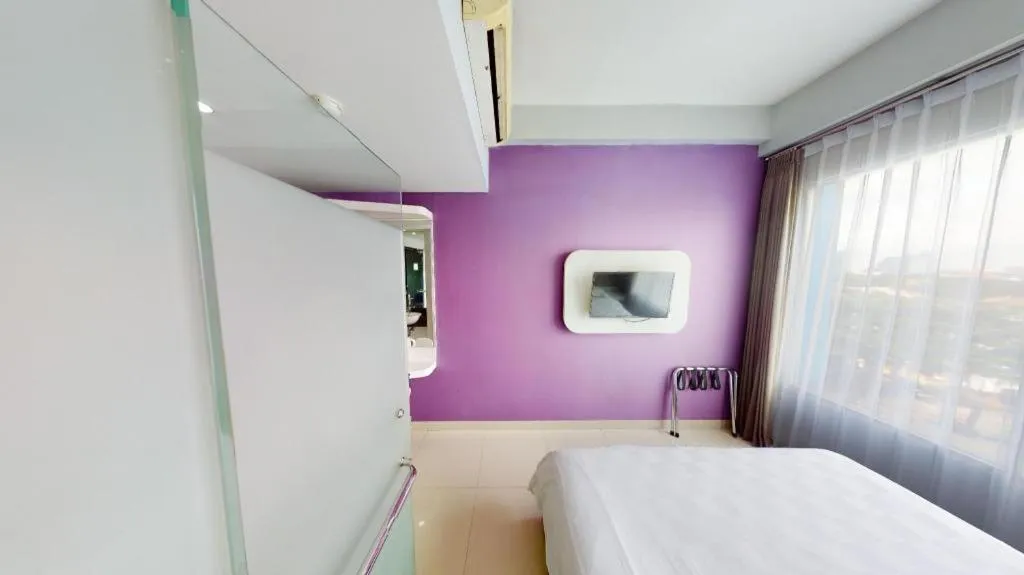 Bed in G Suites Hotel By AMITHYA