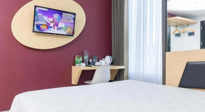 Bed in G Suites Hotel By AMITHYA