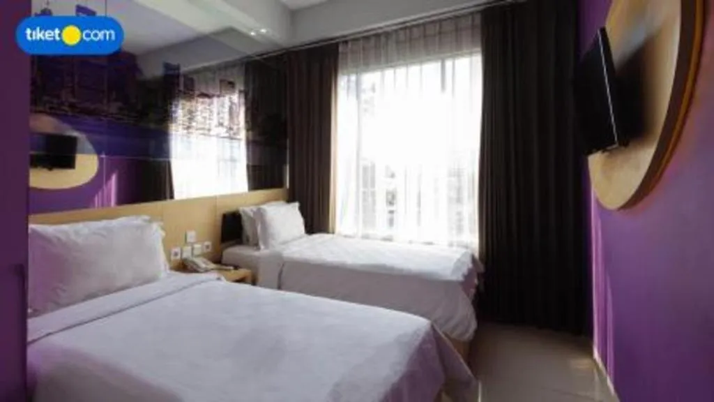 Bed in G Suites Hotel By AMITHYA