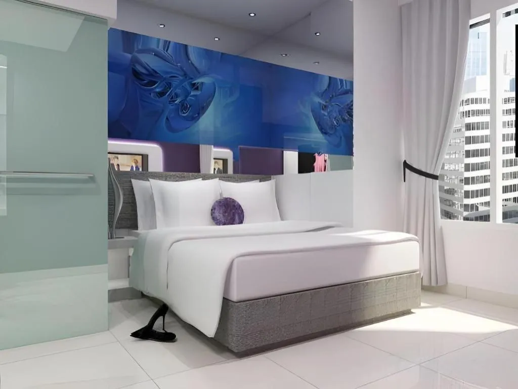 Bed in G Suites Hotel By AMITHYA