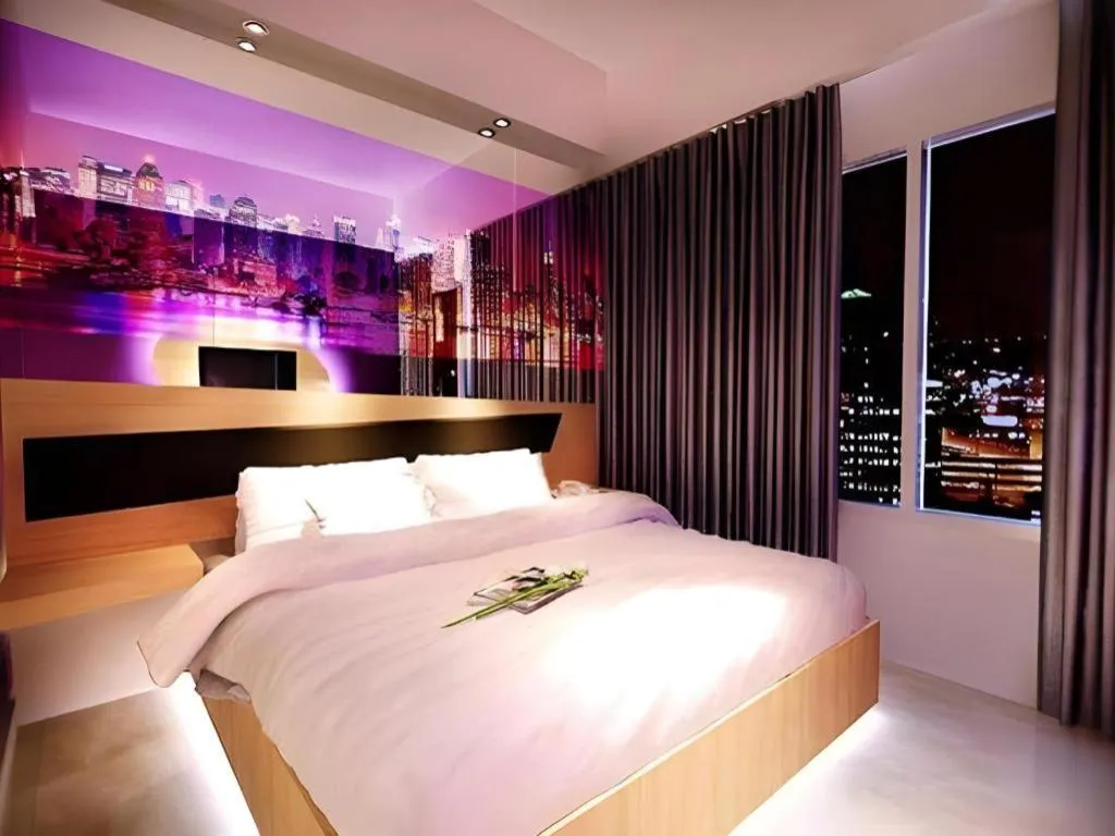 Bed in G Suites Hotel By AMITHYA