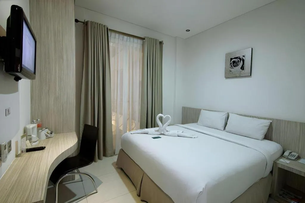 Bed in HW Hotel Padang