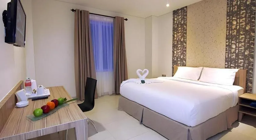 Bed in HW Hotel Padang