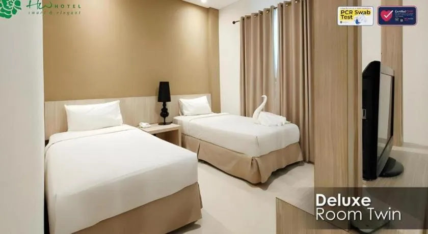 Bed in HW Hotel Padang