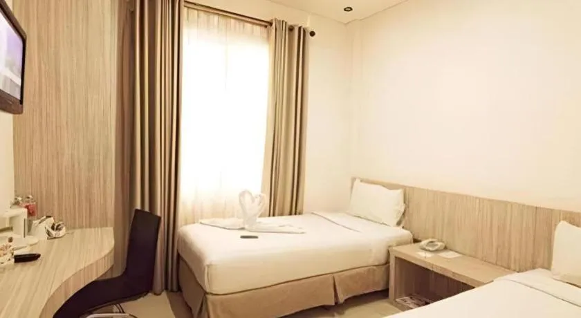 Bed in HW Hotel Padang