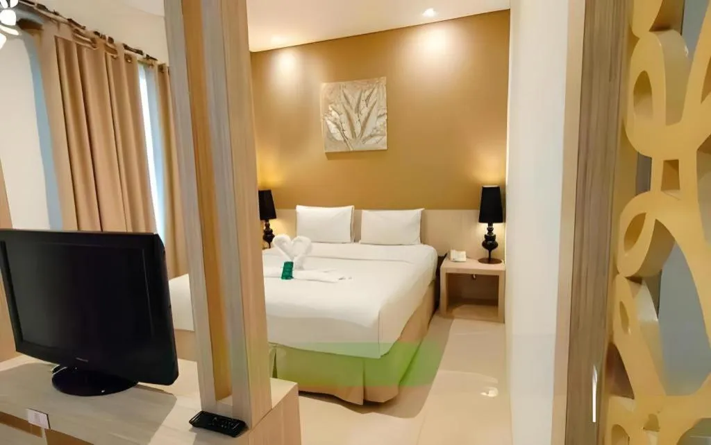 Bed in HW Hotel Padang