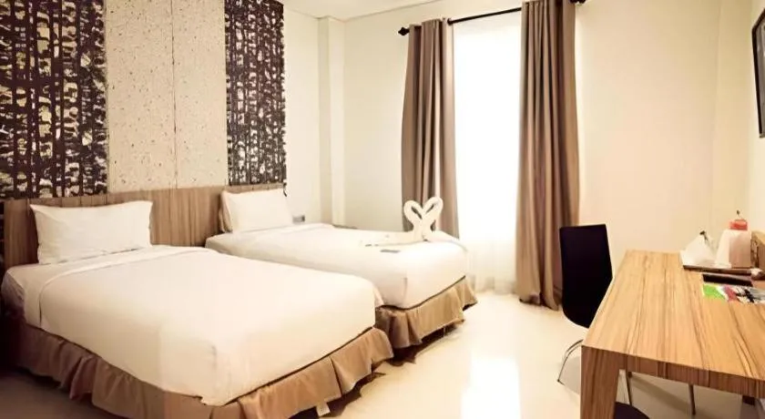 Bed in HW Hotel Padang