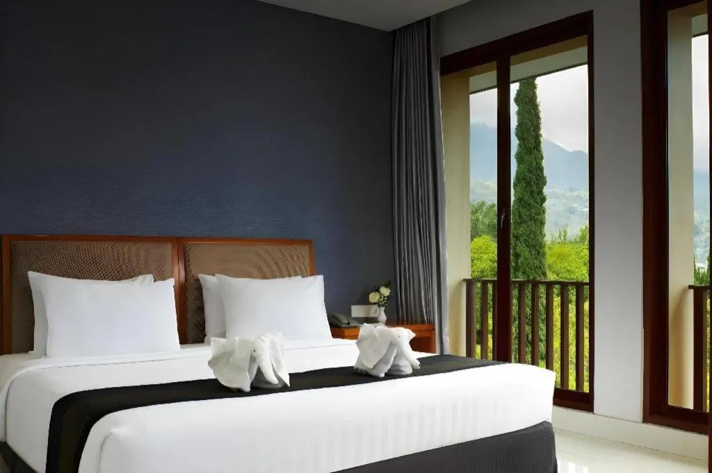 Bed in eL Hotel Kartika Wijaya Batu