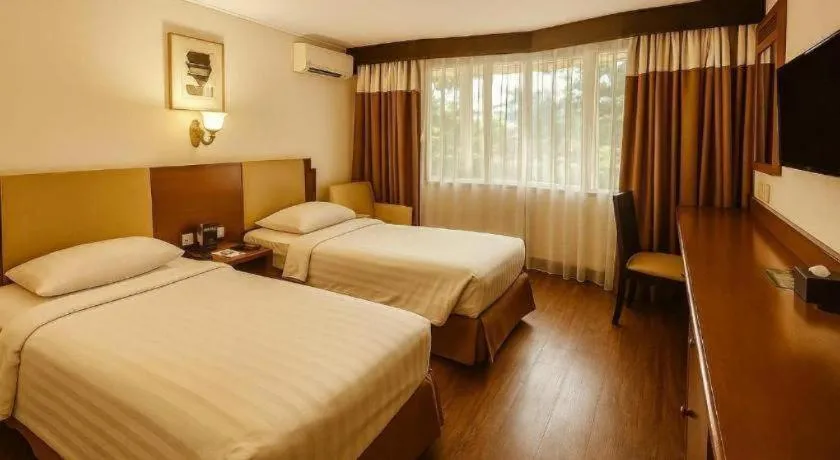 Bed in eL Hotel Kartika Wijaya Batu