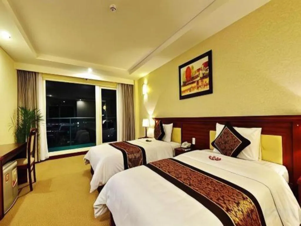 Bed in Tan Binh Hotel