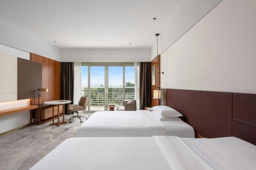 Bed in Grand Soluxe Hotel and Resort Sanya