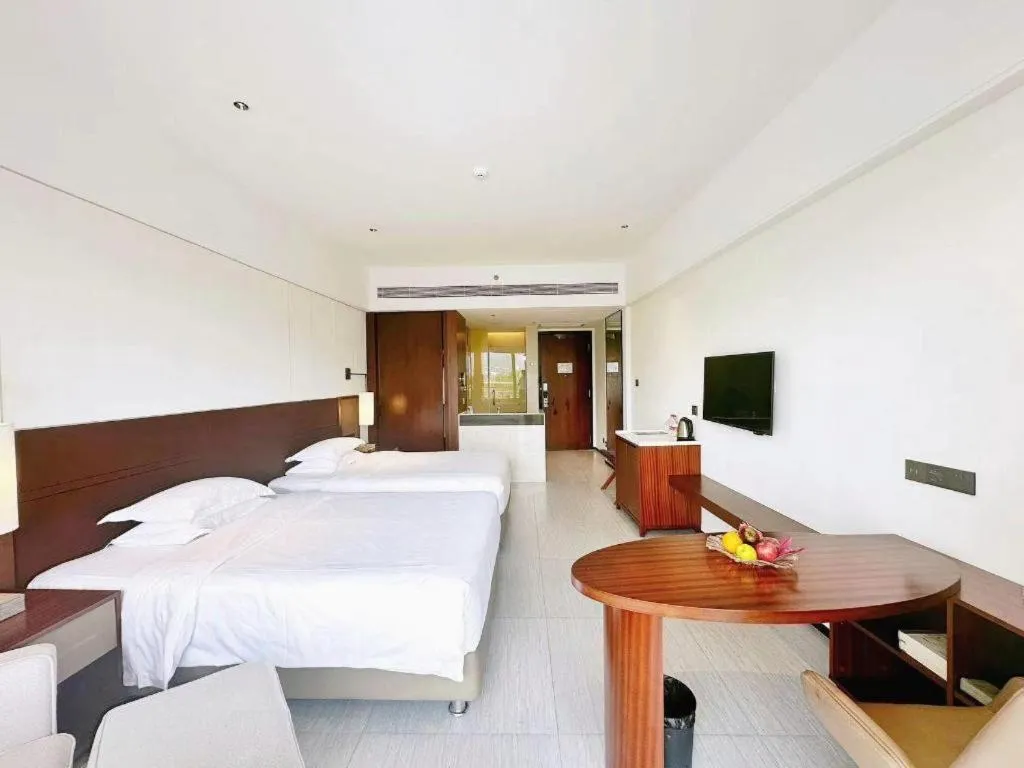 Bed in Grand Soluxe Hotel and Resort Sanya