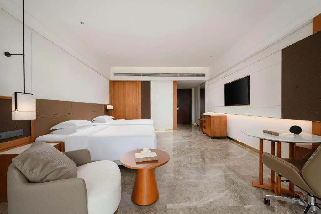 Bed in Grand Soluxe Hotel and Resort Sanya