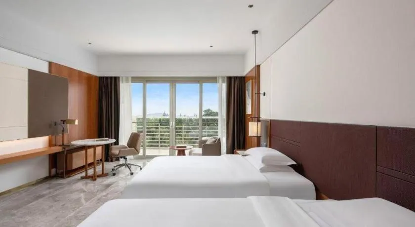 Bed in Grand Soluxe Hotel and Resort Sanya