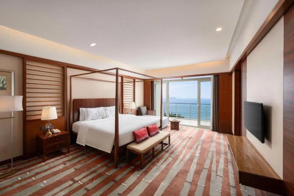 Bed in Grand Soluxe Hotel and Resort Sanya