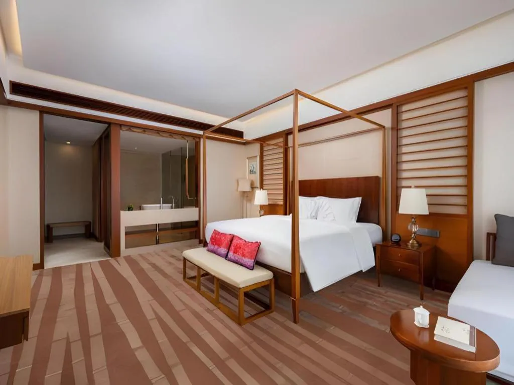 Bed in Grand Soluxe Hotel and Resort Sanya