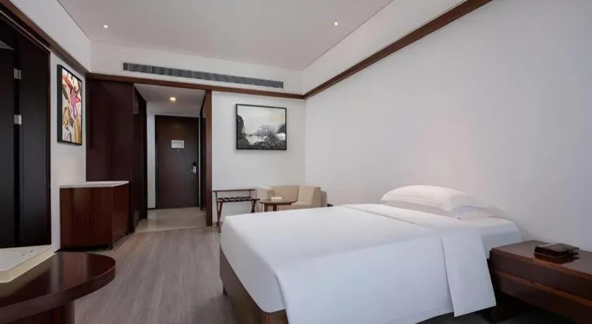 Bed in Grand Soluxe Hotel and Resort Sanya