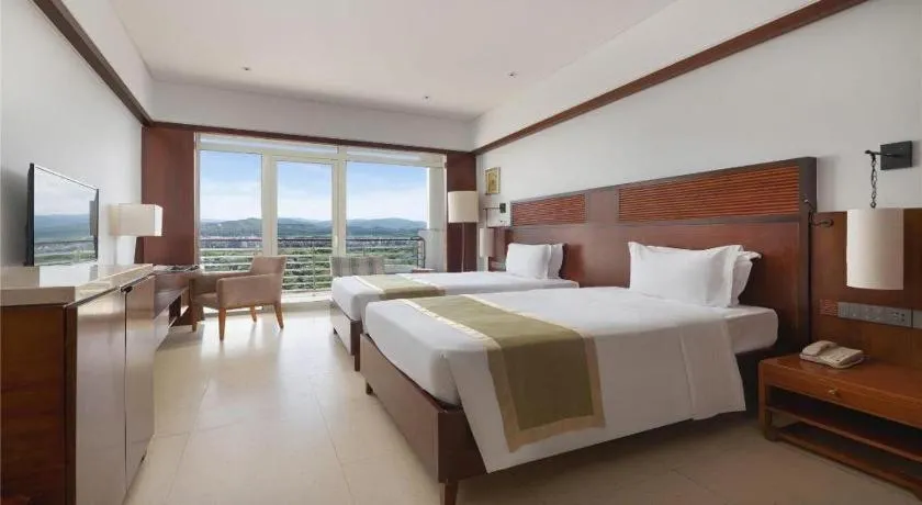 Bed in Grand Soluxe Hotel and Resort Sanya