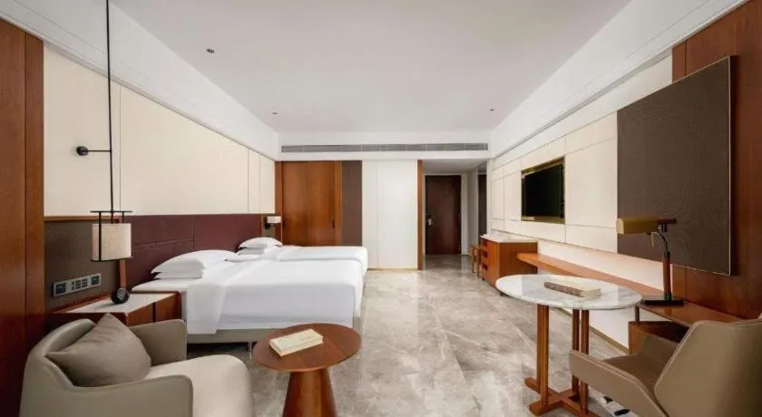 Bed in Grand Soluxe Hotel and Resort Sanya