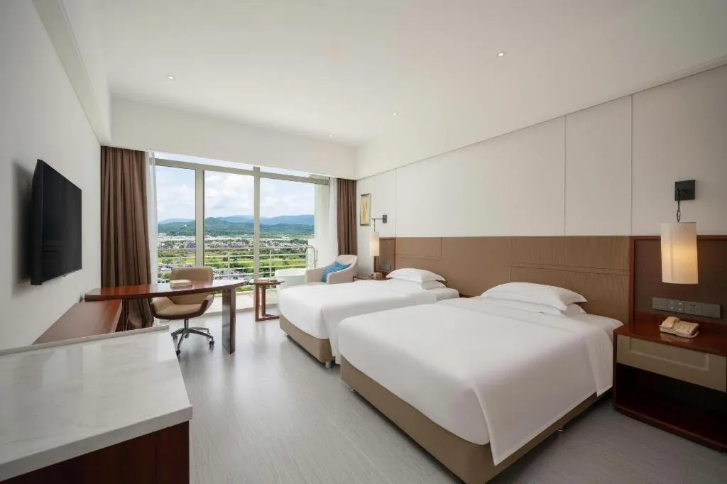 Bed in Grand Soluxe Hotel and Resort Sanya