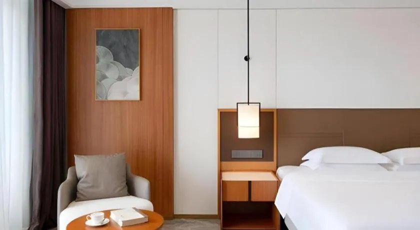 Bed in Grand Soluxe Hotel and Resort Sanya