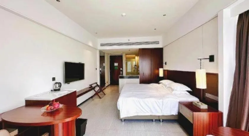 Bed in Grand Soluxe Hotel and Resort Sanya