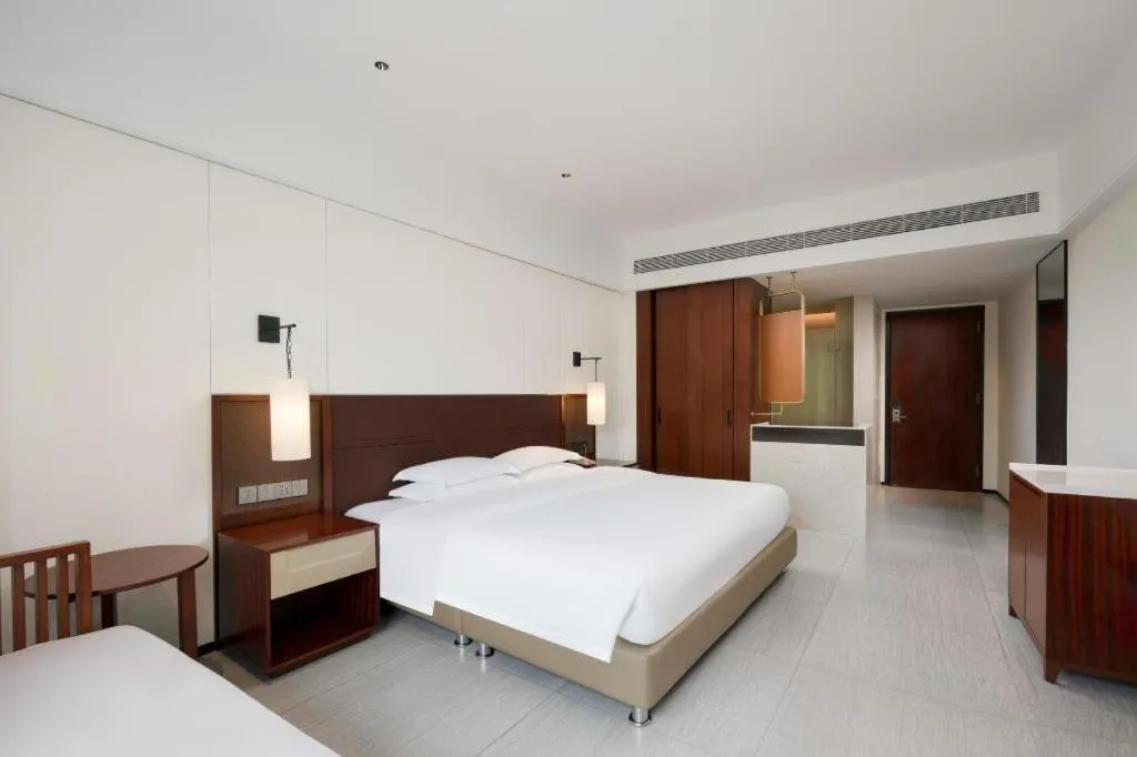 Bed in Grand Soluxe Hotel and Resort Sanya