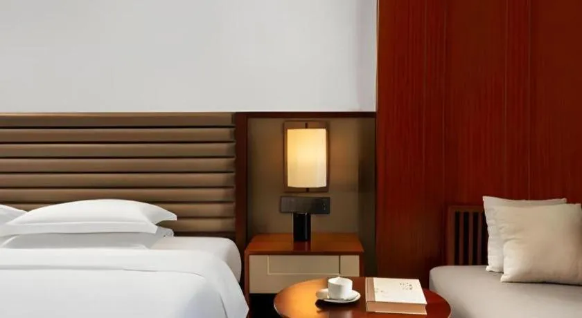 Bed in Grand Soluxe Hotel and Resort Sanya