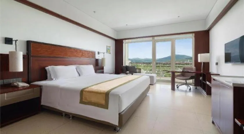 Bed in Grand Soluxe Hotel and Resort Sanya