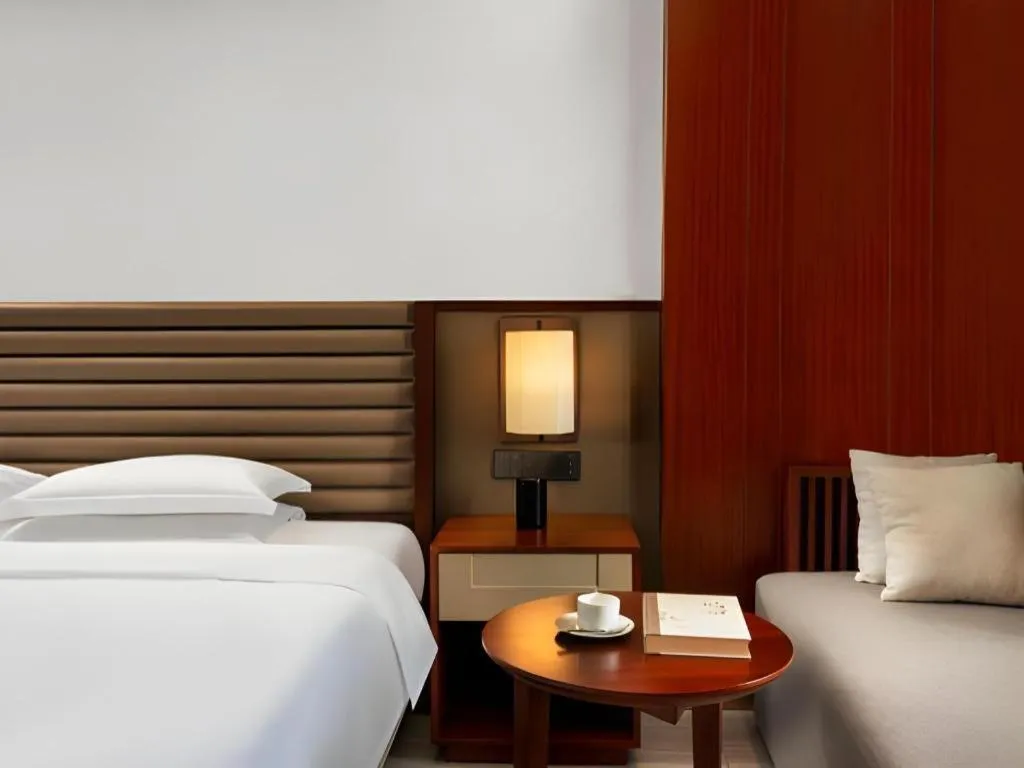 Bed in Grand Soluxe Hotel and Resort Sanya