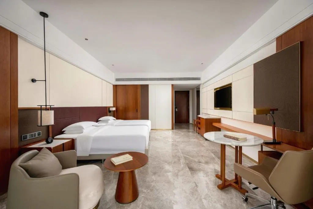 Bed in Grand Soluxe Hotel and Resort Sanya