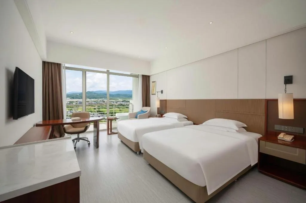 Bed in Grand Soluxe Hotel and Resort Sanya