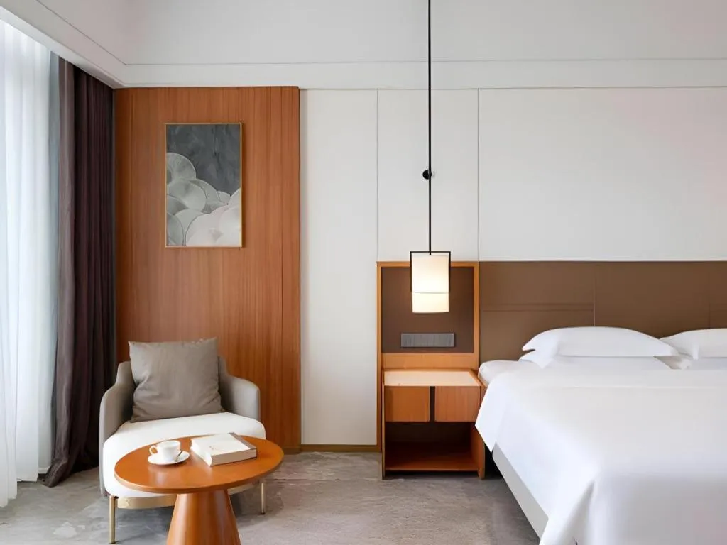 Bed in Grand Soluxe Hotel and Resort Sanya