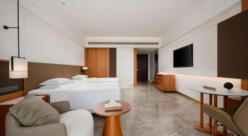 Bed in Grand Soluxe Hotel and Resort Sanya