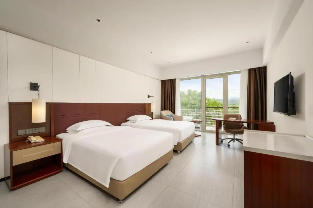 Bed in Grand Soluxe Hotel and Resort Sanya