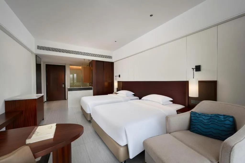Bed in Grand Soluxe Hotel and Resort Sanya